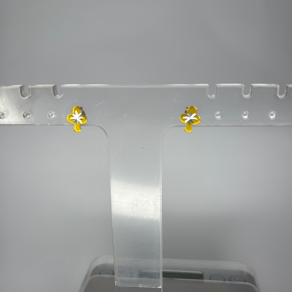 Gold and Silver Prong Set Earrings